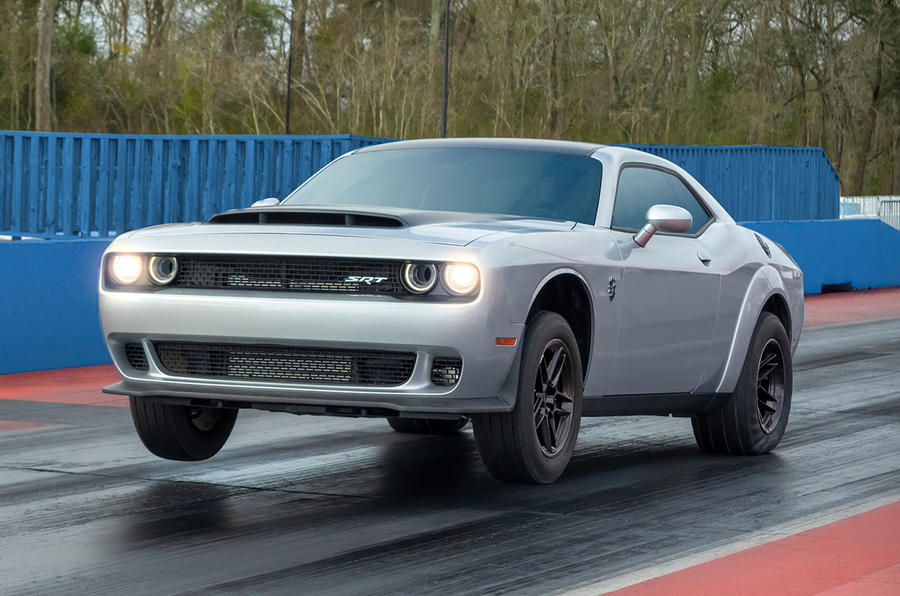 dodge-challenger-srt-demon-170-2023-front-quarter-tracking-wheelie.jpg